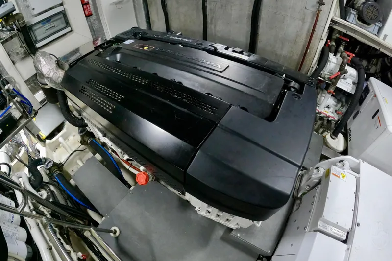 Slide: The Image of Engine room of 2016 Absolute 72 FLY yacht, showcasing advanced machinery and components. - 126