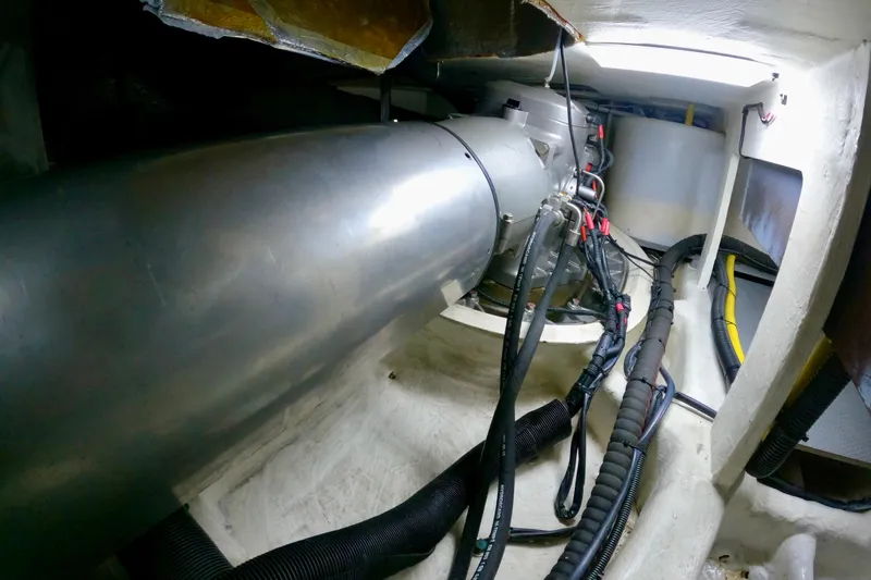 Slide: The Image of Engine room of 2016 Absolute 72 FLY yacht with visible machinery and cables. - 130