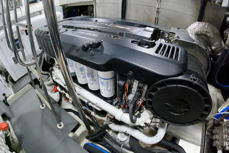 Slide: The Image of Engine room of a 2016 Absolute 72 FLY yacht, featuring a Volvo Penta IPS1200. - 132