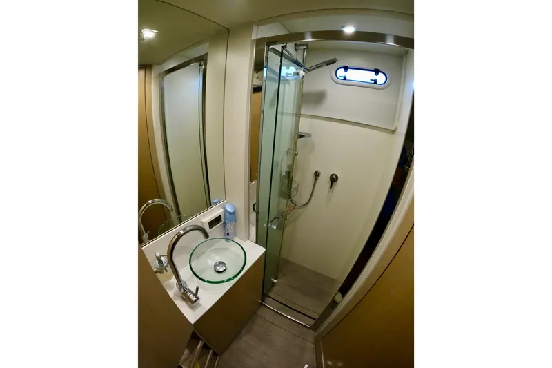 Slide: The Image of Luxurious bathroom in 2016 Absolute 72 FLY yacht with glass shower and modern sink. - 134