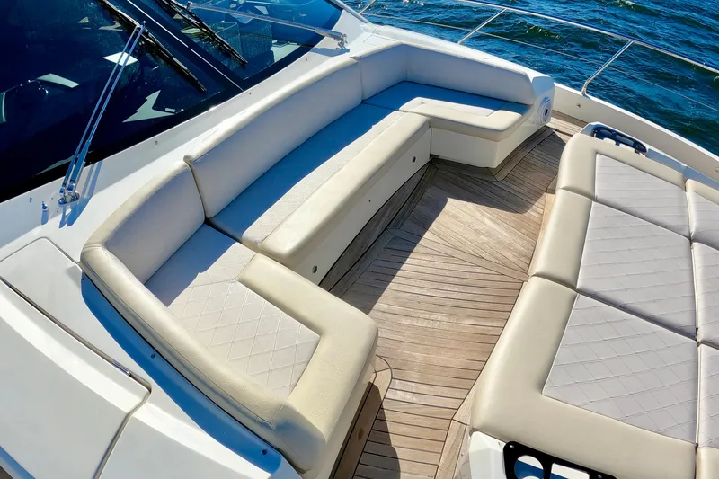 Slide: The Image of Luxurious seating on 2016 Absolute 72 FLY yacht with elegant wood deck. - 140