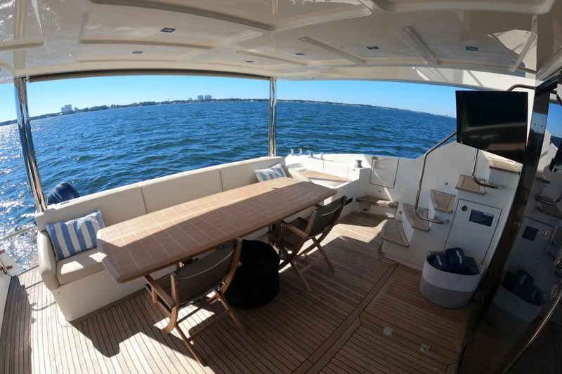 Slide: The Image of Luxurious Absolute 72 FLY yacht deck with seating, table, and ocean view, 2016 model. - 148