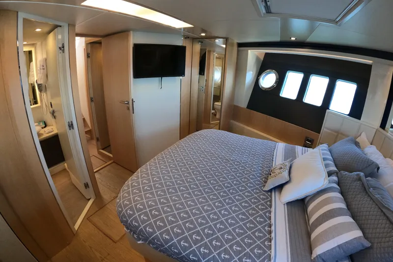 Slide: The Image of Luxurious bedroom interior of 2016 Absolute 72 FLY yacht with modern amenities. - 154
