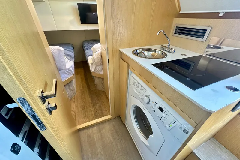 Slide: The Image of Compact kitchen and bedroom in 2016 Absolute 72 FLY yacht, featuring modern amenities. - 37