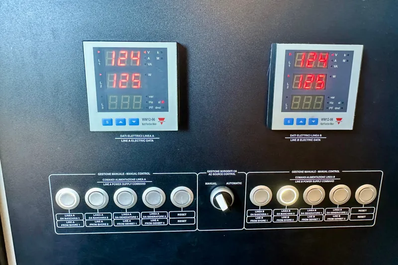 Slide: The Image of Control panel of Absolute 72 FLY 2016 yacht with digital displays and manual controls. - 42