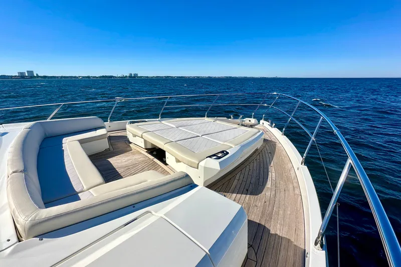 Slide: The Image of Luxurious 2016 Absolute 72 FLY yacht deck with ocean view and seating area. - 45