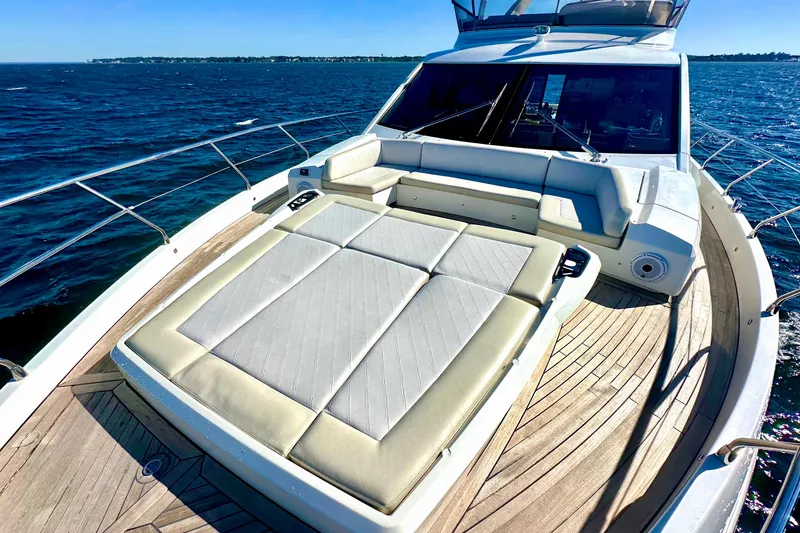 Slide: The Image of Luxurious 2016 Absolute 72 FLY yacht with spacious sun deck on open water. - 48