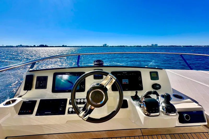 Slide: The Image of Cockpit view of 2016 Absolute 72 FLY yacht with ocean backdrop. - 52
