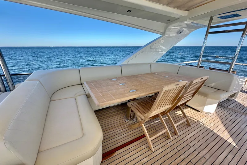 Slide: The Image of Luxurious outdoor seating on 2016 Absolute 72 FLY yacht with ocean view. - 58