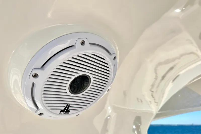 Slide: The Image of JL Audio speaker on 2016 Absolute 72 FLY yacht, white interior, ocean view. - 62