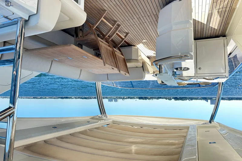 Slide: The Image of Luxurious 2016 Absolute 72 FLY yacht interior with elegant seating and ocean view. - 64