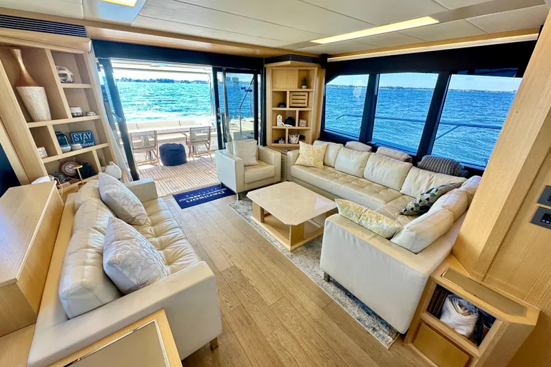 Slide: The Image of Luxurious interior of 2016 Absolute 72 FLY yacht with ocean view and elegant seating. - 75