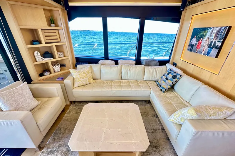 Slide: The Image of Luxurious interior of 2016 Absolute 72 FLY yacht with elegant seating and ocean view. - 78