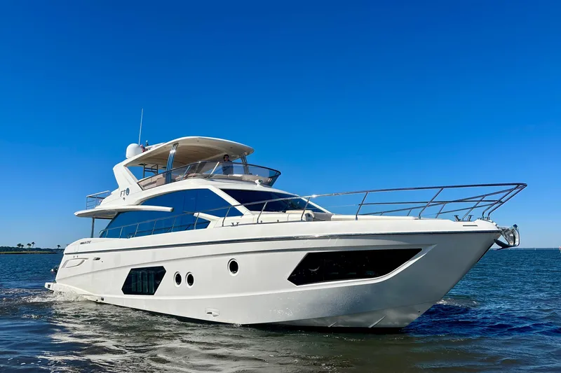 Slide: The Image of Luxury yacht Absolute 72 FLY 2016 cruising on open water under clear blue sky. - 8