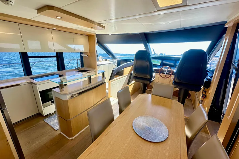 Slide: The Image of Luxurious interior of 2016 Absolute 72 FLY yacht with modern kitchen and dining area. - 80