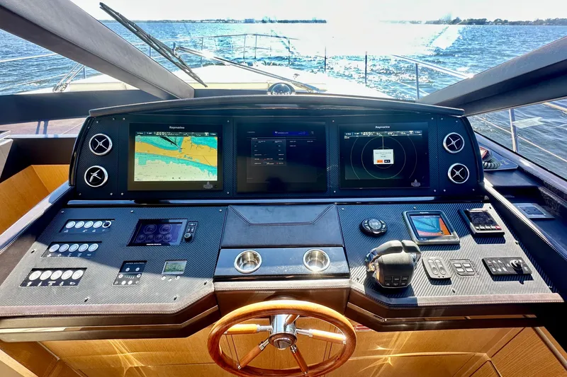 Slide: The Image of Cockpit of 2016 Absolute 72 FLY yacht with advanced navigation systems and controls. - 82