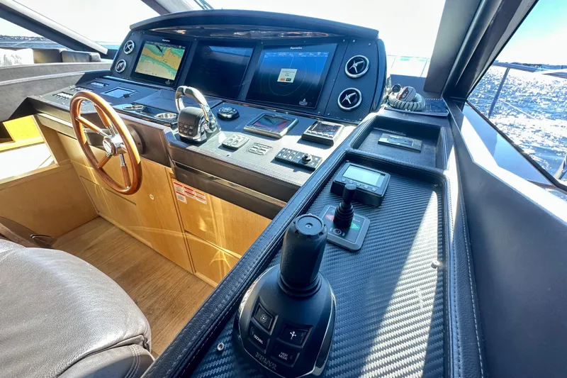 Slide: The Image of Cockpit of 2016 Absolute 72 FLY yacht with advanced navigation controls and displays. - 83