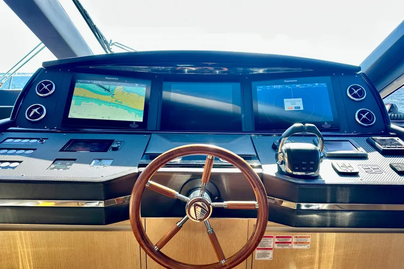 Slide: The Image of Cockpit of 2016 Absolute 72 FLY yacht with navigation screens and steering wheel. - 87