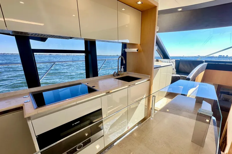 Slide: The Image of Luxurious kitchen interior of 2016 Absolute 72 FLY yacht with ocean view. - 89