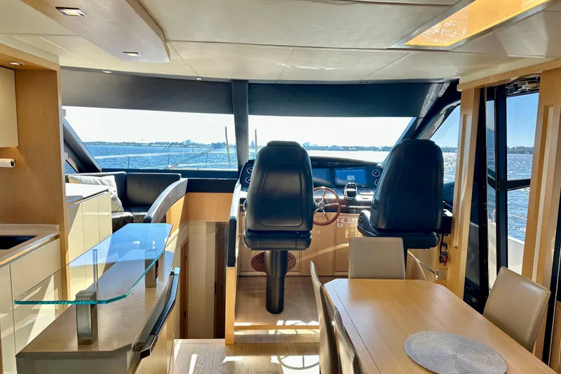 Slide: The Image of Luxurious interior of 2016 Absolute 72 FLY yacht with modern helm and dining area. - 91