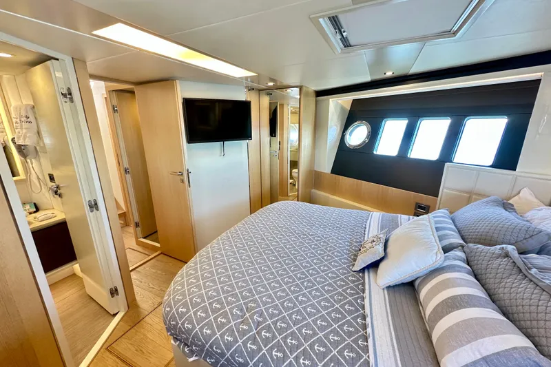 Slide: The Image of Luxurious bedroom interior of 2016 Absolute 72 FLY yacht with modern amenities. - 93