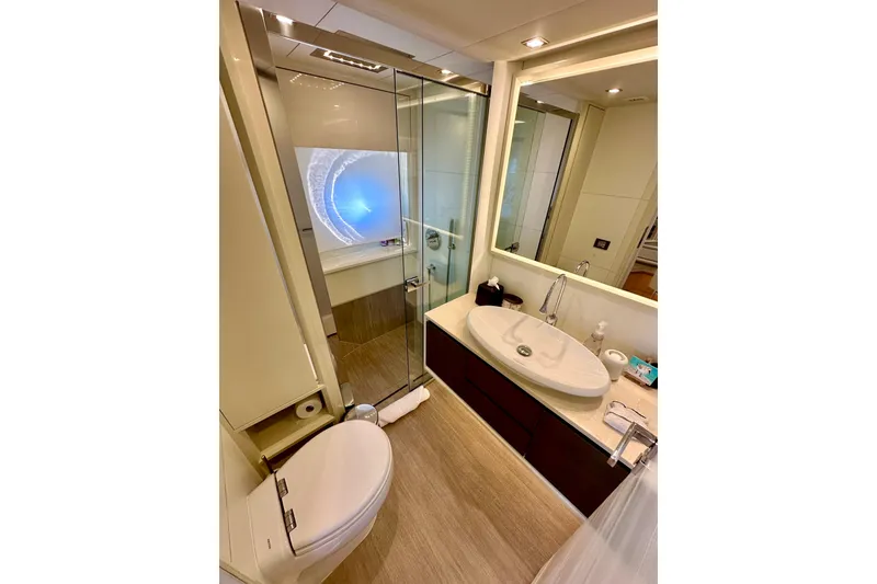 Slide: The Image of Luxurious bathroom in 2016 Absolute 72 FLY yacht with modern fixtures and elegant design. - 94