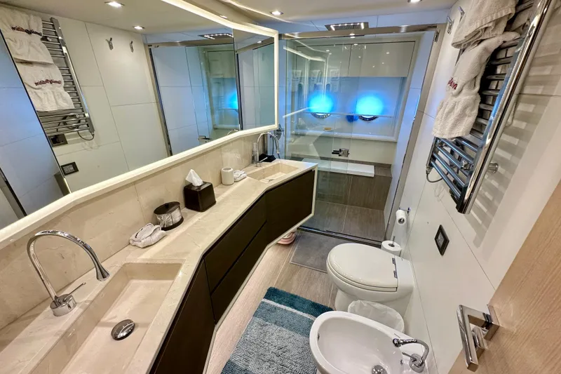 Slide: The Image of Luxurious bathroom in 2016 Absolute 72 FLY yacht with modern fixtures and elegant design. - 96
