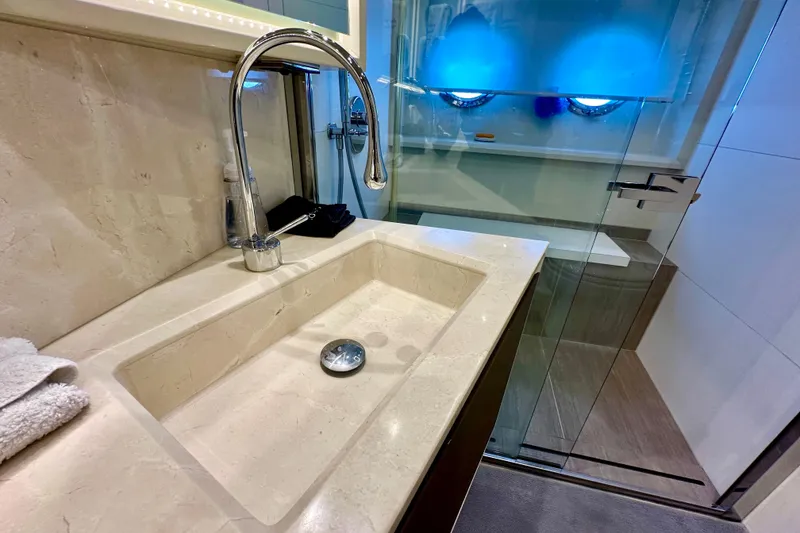 Slide: The Image of Luxurious bathroom sink and shower in 2016 Absolute 72 FLY yacht. - 97