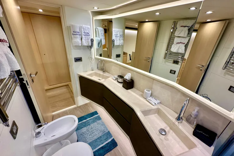 Slide: The Image of Luxurious bathroom in 2016 Absolute 72 FLY yacht with modern fixtures and elegant design. - 98