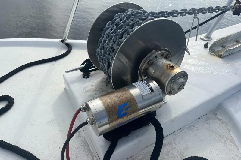 Slide: The Image of Anchor winch on 1983 Custom Key West 39' Sportfish boat deck. - 40