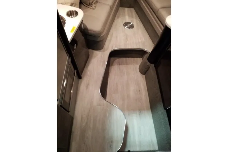 Slide: The Image of 2019 Formula 310 Sun Sport interior with sleek wood flooring and modern seating. - 15