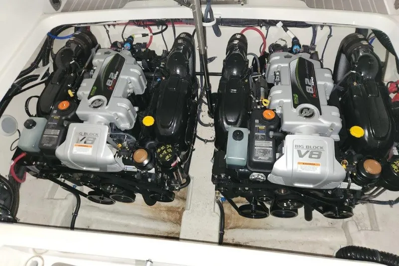 Slide: The Image of Twin V8 engines in a 2019 Formula 310 Sun Sport boat. - 4