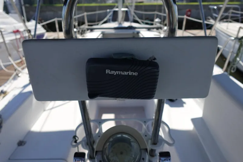 Slide: The Image of Cockpit of 1997 Catalina 28 sailboat with Raymarine navigation equipment. - 11