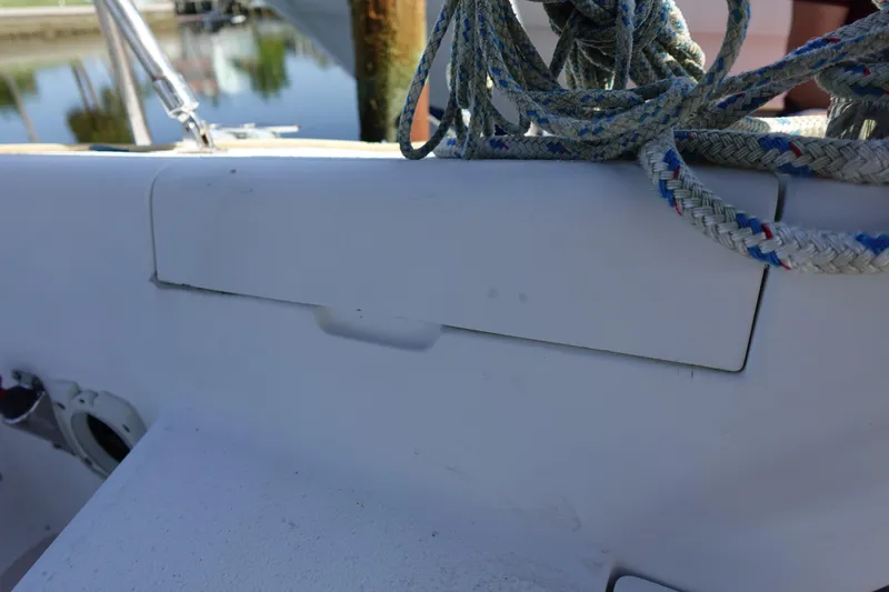 Slide: The Image of Close-up of a 1997 Catalina 28 sailboat deck with coiled ropes. - 27