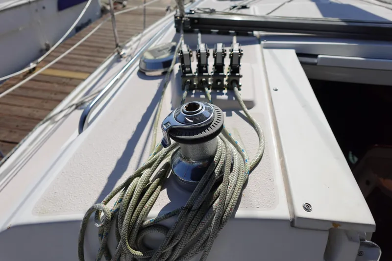 Slide: The Image of Deck of 1997 Catalina 28 sailboat with winch and ropes. - 30