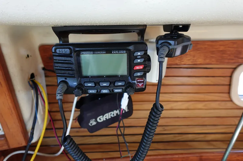 Slide: The Image of VHF radio on 1997 Catalina 28 sailboat, featuring Standard Horizon Explorer model. - 40