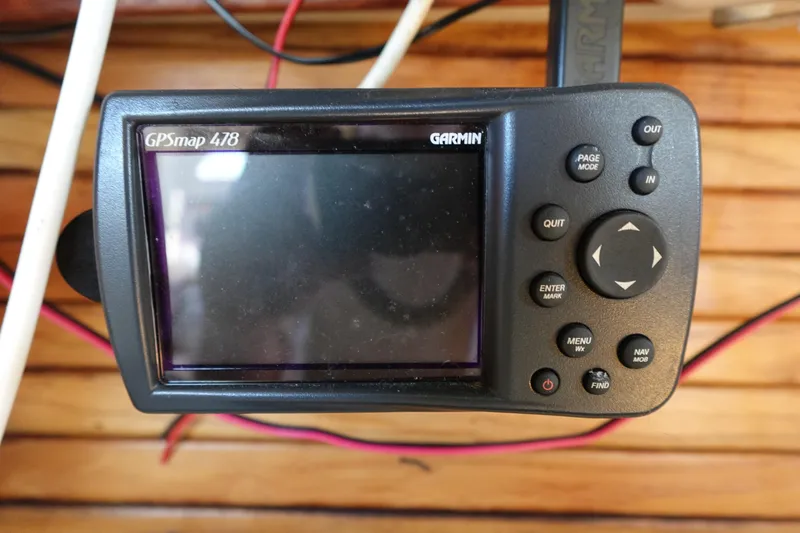Slide: The Image of Garmin GPSmap 478 device on a 1997 Catalina 28 boat dashboard. - 41