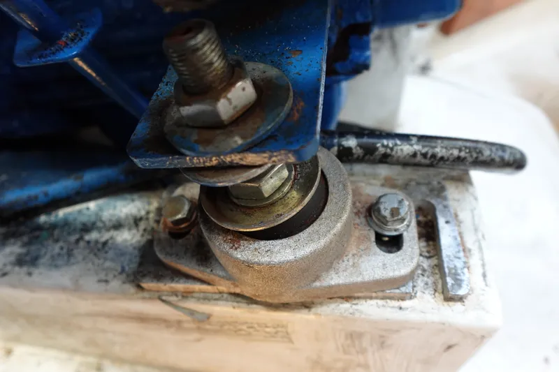 Slide: The Image of Close-up of a Catalina 28 sailboat engine mount, showing rust and wear. - 67