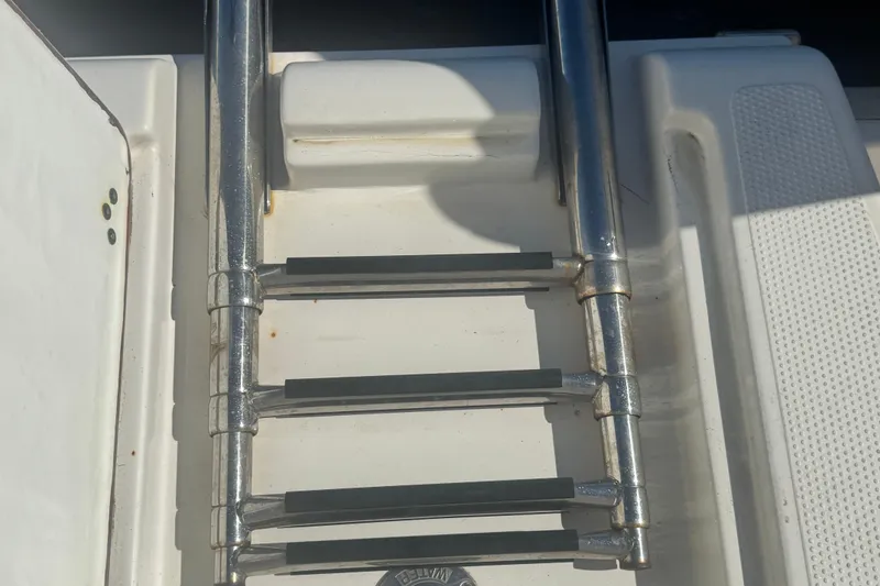 Slide: The Image of Stainless steel boat ladder on 2024 Sailfish 241 CC deck. - 20