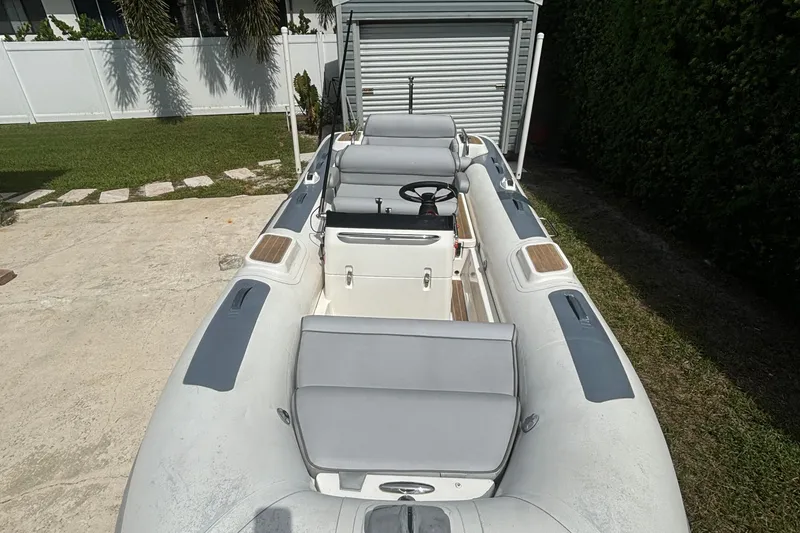 Slide: The Image of 2019 Williams Jet Tenders Dieseljet 505 inflatable boat, parked outdoors on concrete. - 7