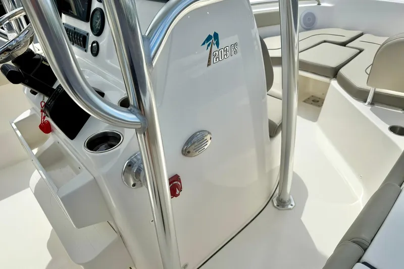 Slide: The Image of 2022 Key West 203 FS boat interior with console and seating area. - 15
