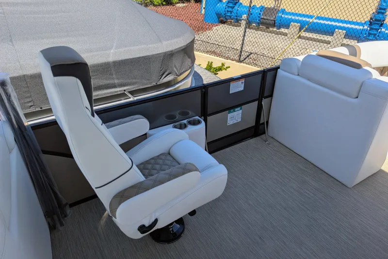 Slide: The Image of Luxurious seating on 2026 Trifecta 23RFSS pontoon boat with modern design and cup holders. - 13