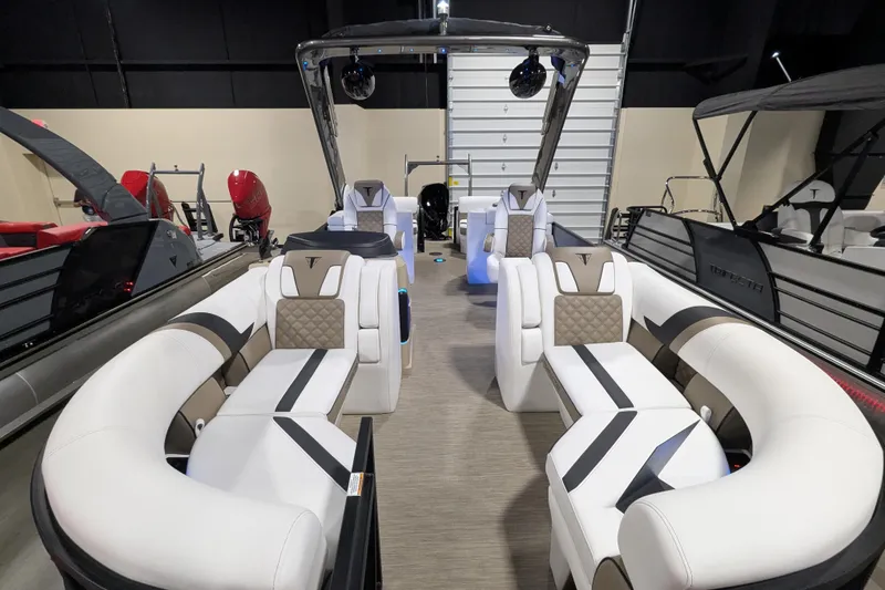 Slide: The Image of 2026 Trifecta 23RFSS pontoon boat interior with luxurious seating and modern design. - 16