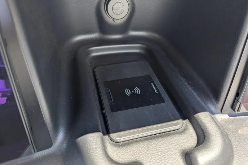 Slide: The Image of Wireless charging pad in 2026 Trifecta 23RFSS vehicle console with USB port. - 9