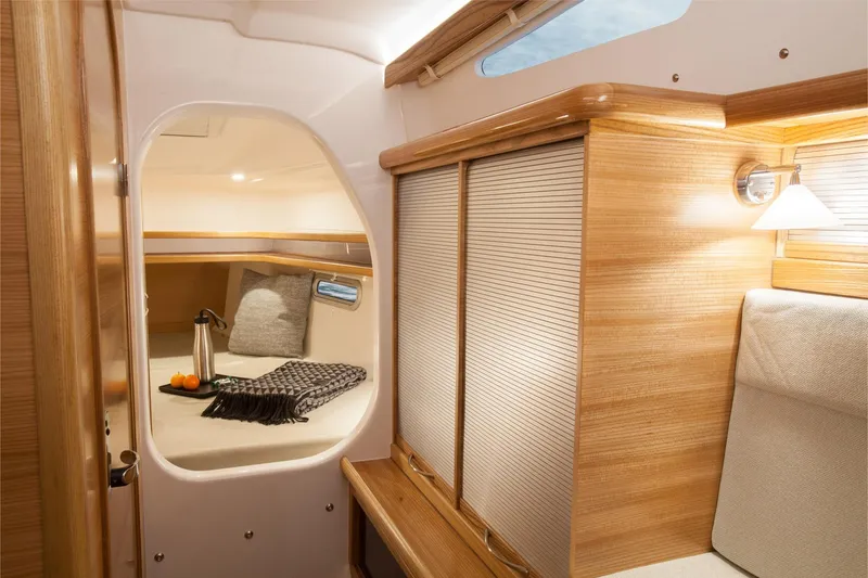 Slide: The Image of Luxurious interior of 2025 Dragonfly 32 Evolution yacht with cozy cabin and modern design. - 40