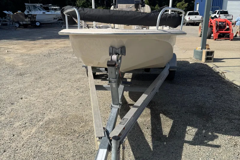Slide: The Image of 2018 Carolina Skiff 16 JVX CC boat on trailer in outdoor setting. - 3