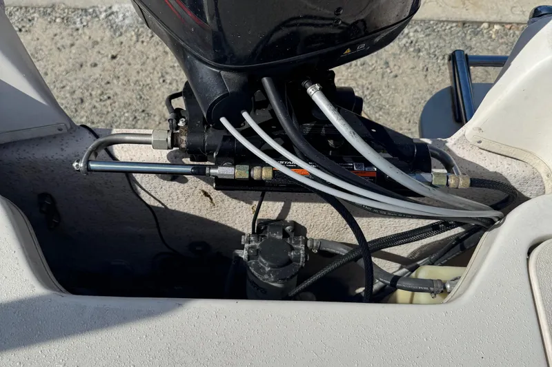 Slide: The Image of 2018 Carolina Skiff 16 JVX CC boat engine and hydraulic system close-up. - 6
