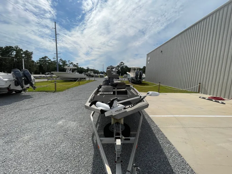 Slide: The Image of 2019 Excel 1860 Stalker SC boat on trailer, outdoor dealership display. - 3