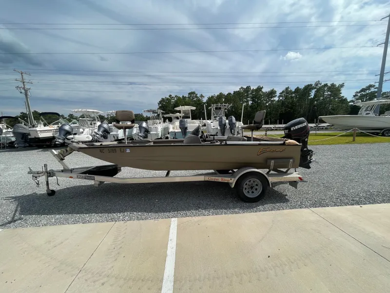 Slide: The Image of 2019 Excel 1860 Stalker SC boat on trailer, parked outdoors. - 5