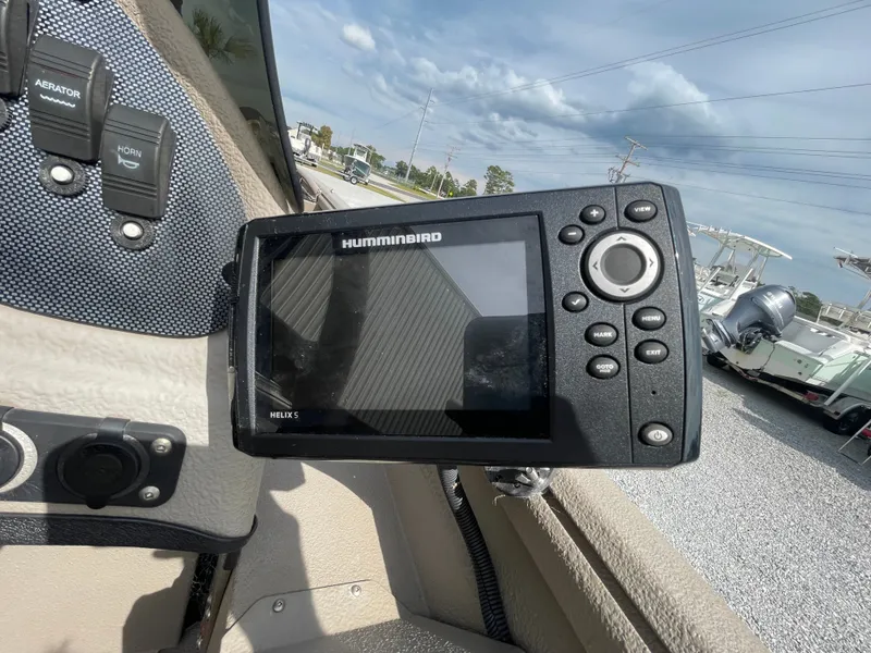 Slide: The Image of Humminbird Helix 5 fish finder on 2019 Excel 1860 Stalker SC boat dashboard. - 9